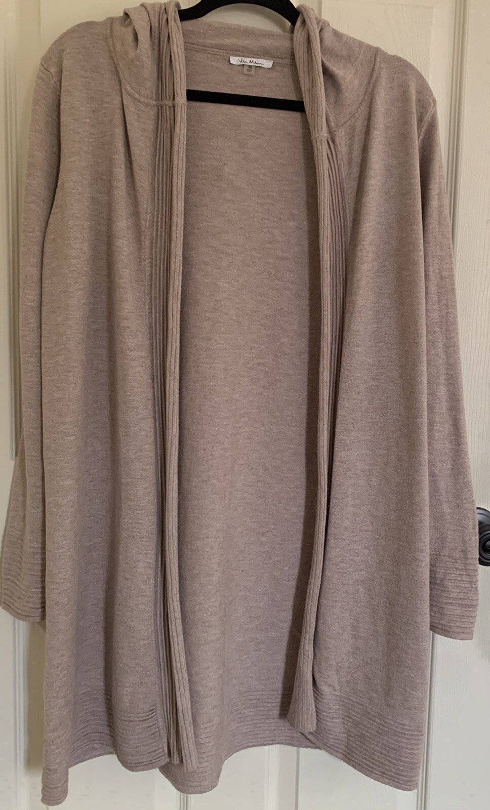 How Old Is Pink Cardigan